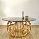 Designer round coffee table in rattan and smoked glass 1970