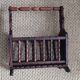 Rustic stained wooden magazine rack