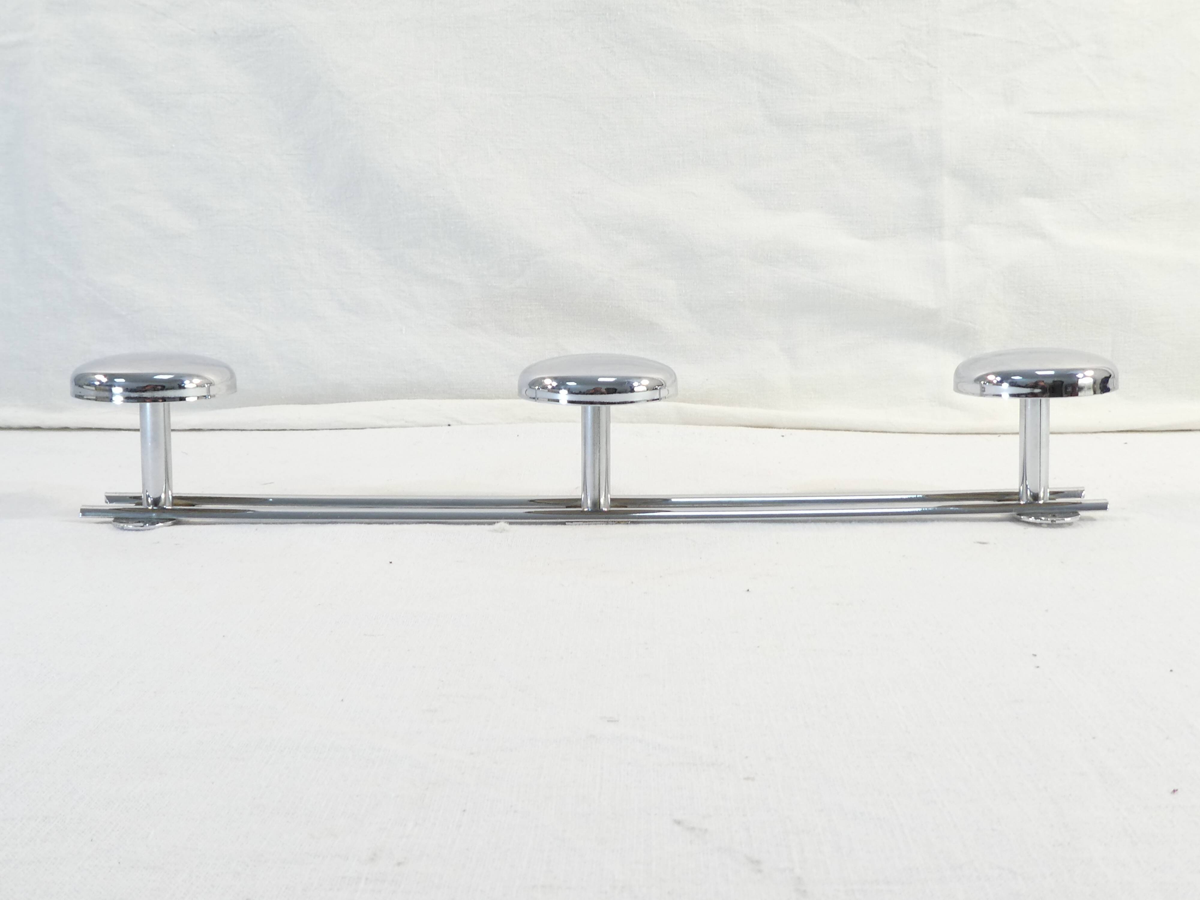 Coat rack has 3 pastes in chromed metal vintage
