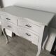 Chest of drawers in wood painted grey