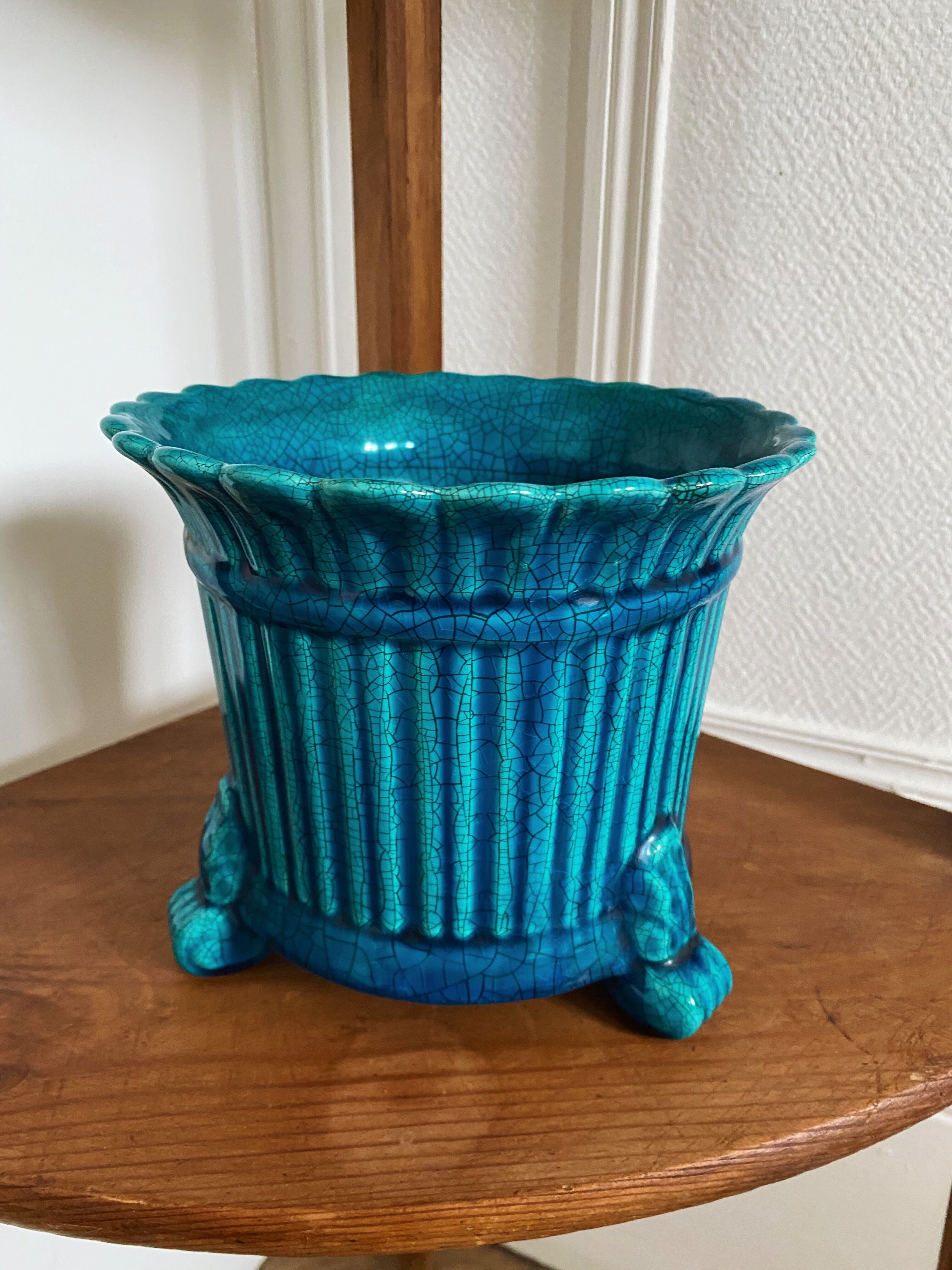 Turquoise ceramic pot cover