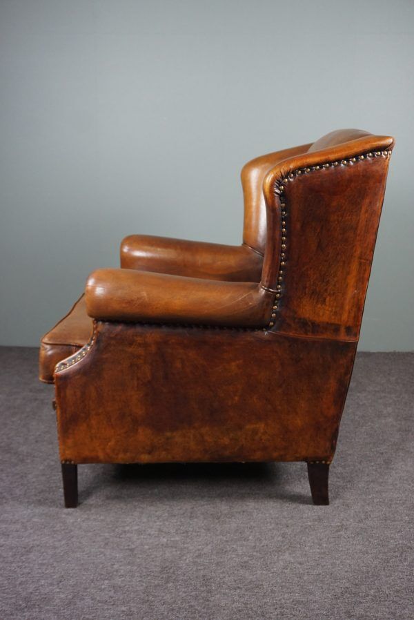 Armchair + sheepskin pouf