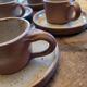 Service of 5 cups and saucers in brown stoneware – 1970s–1980s