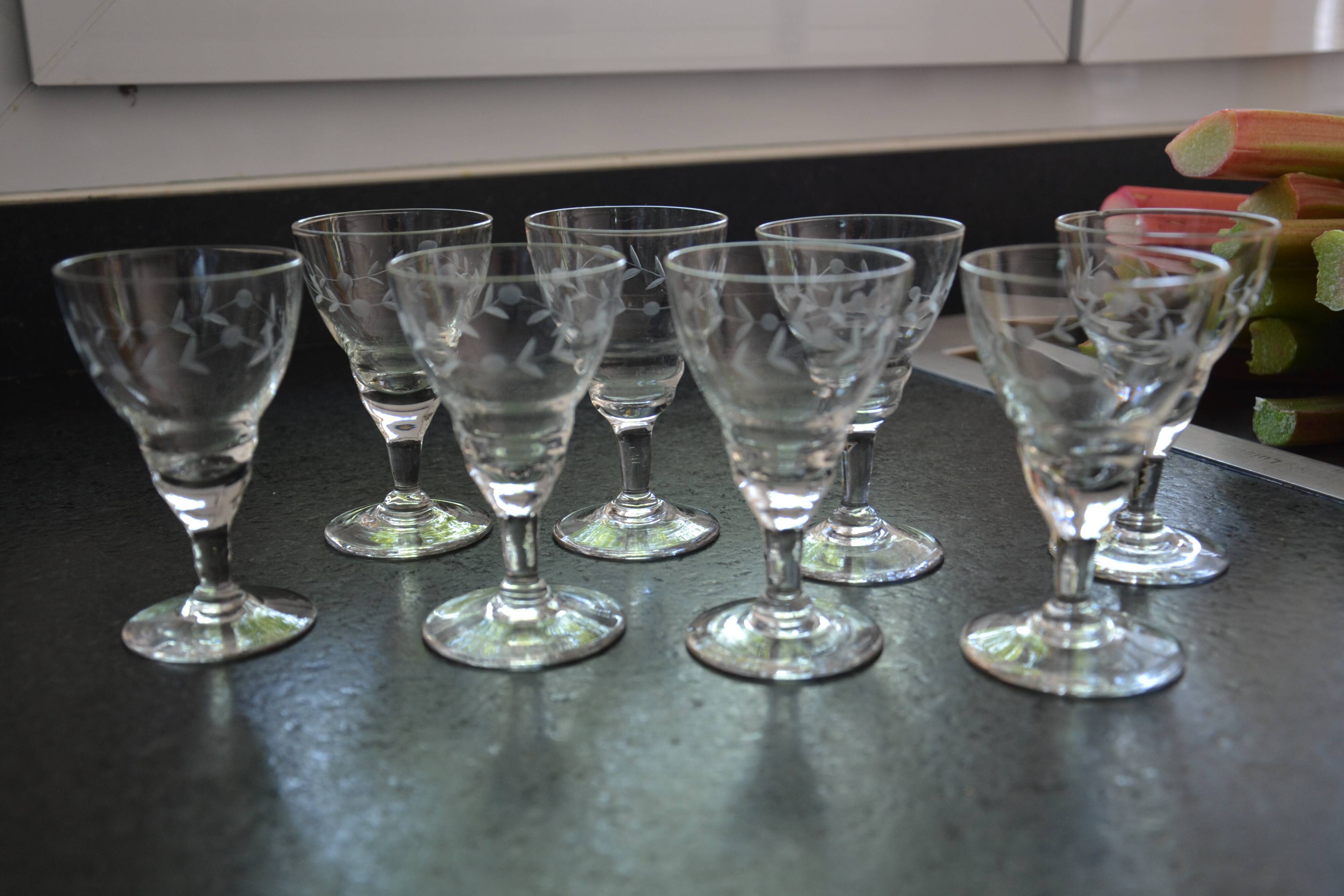 8 small old chiseled glasses