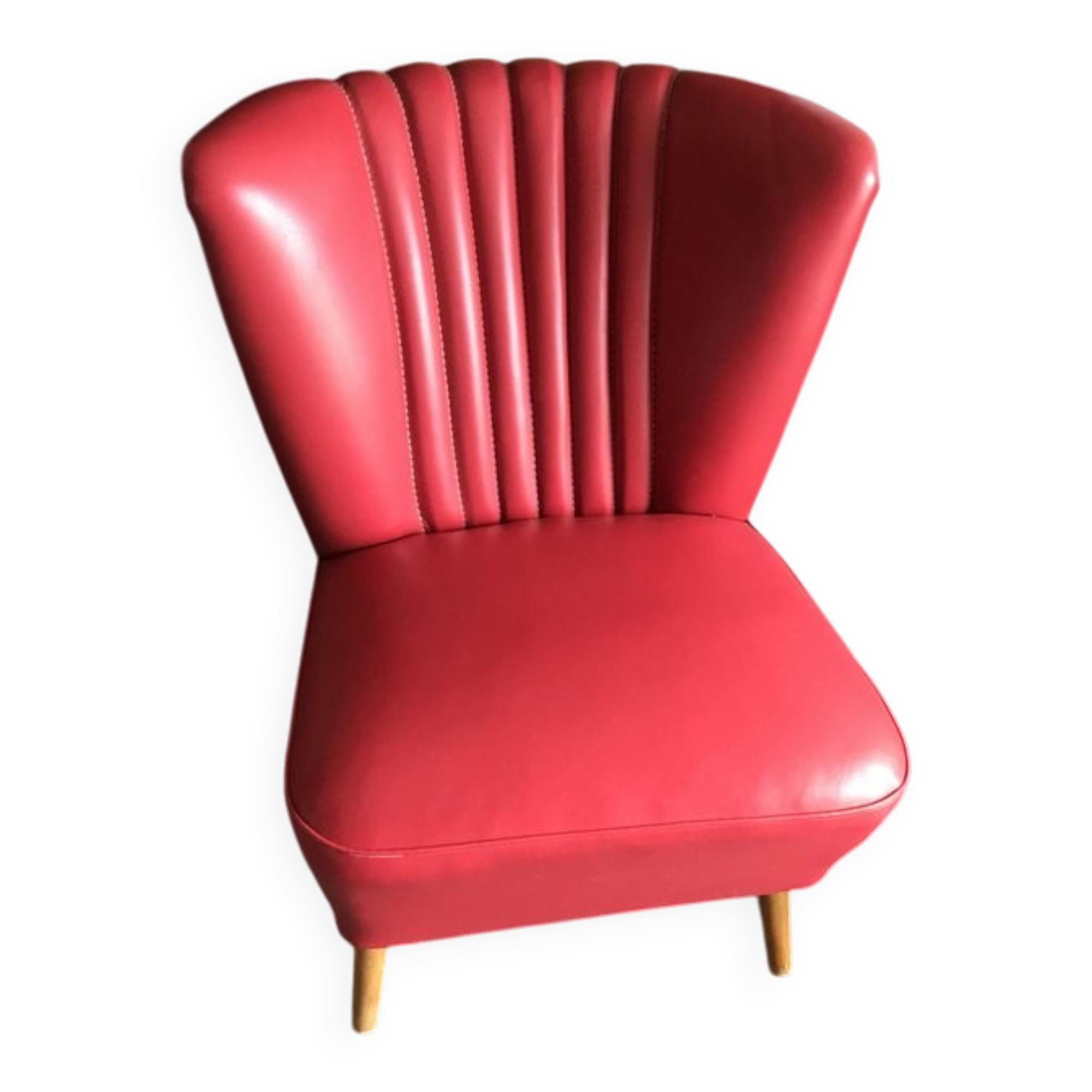 Mid-century cocktail chair in red vinyl and beech, 1950s design from Czechoslovakia.