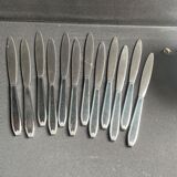 12 "Apollonox" fruit knives on silver metal support