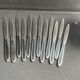 12 "Apollonox" fruit knives on silver metal support