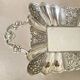 St Louis XV style letter tray, empty pocket, 20th century, in repoussé metal.