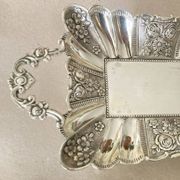 St Louis XV style letter tray, empty pocket, 20th century, in repoussé metal.