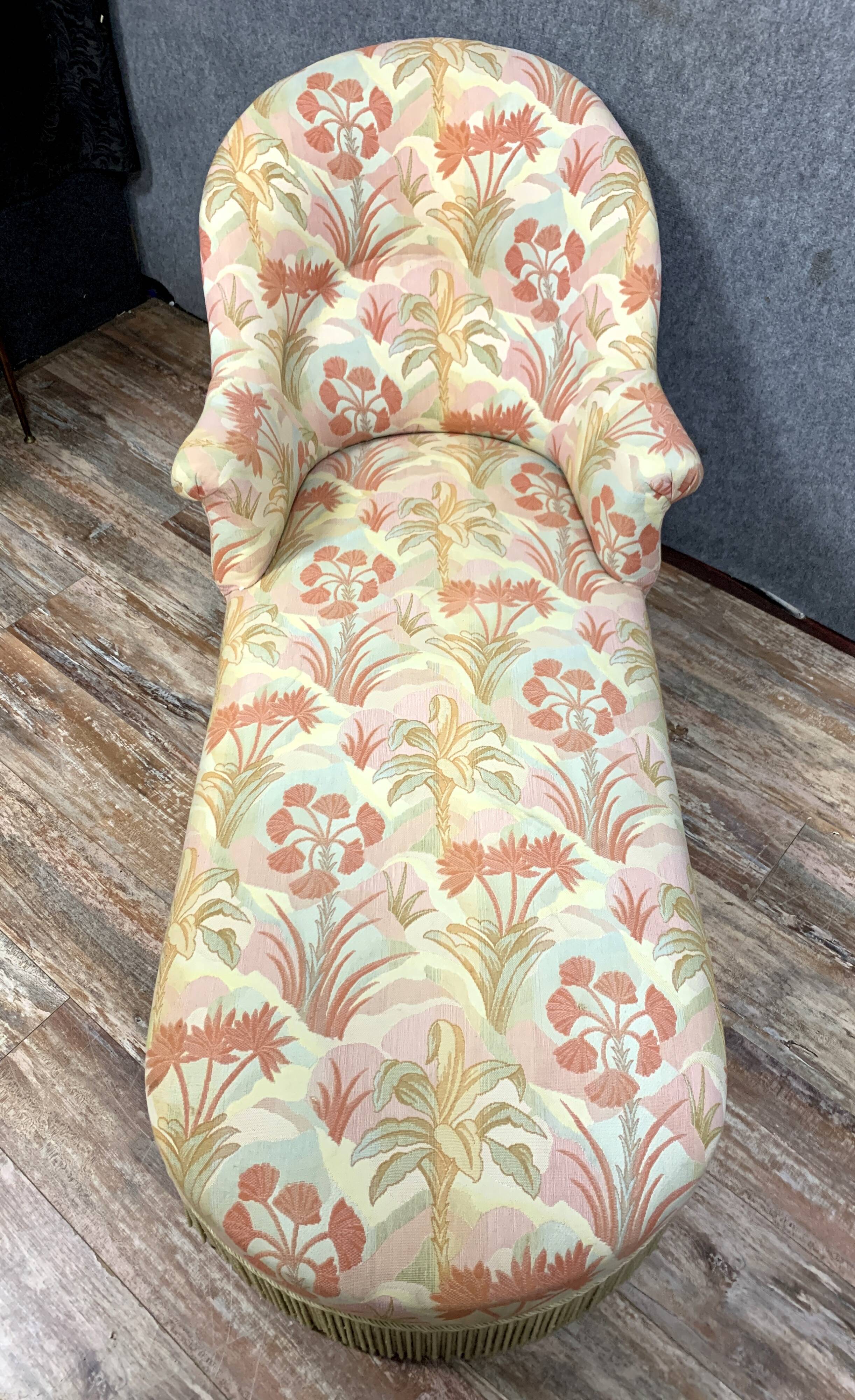 Chaise longue or rest bench Napoleon III era with floral fabric around 1850