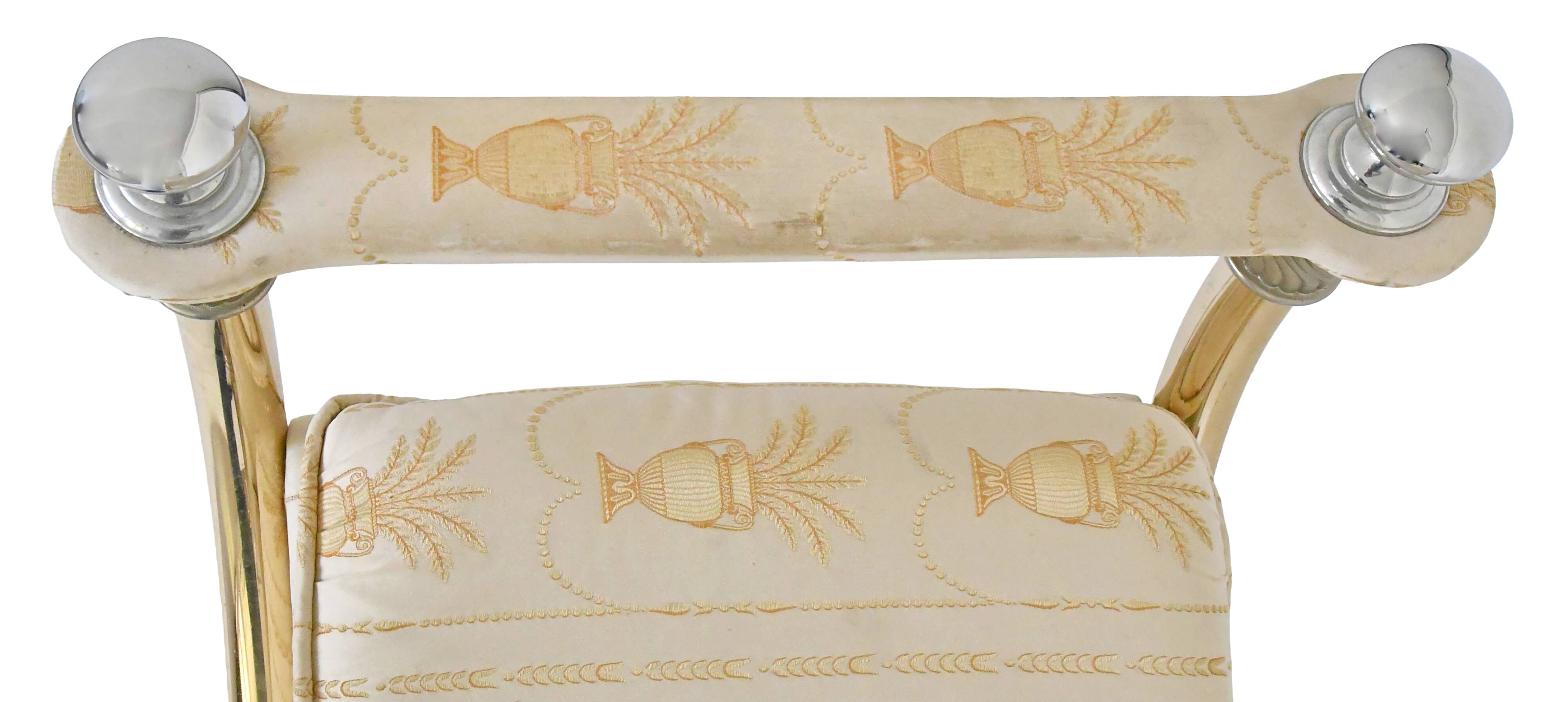 Bench in gilded brass and Empire-style fabric