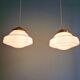 Pair of Art Deco pendant lights in white opaline.