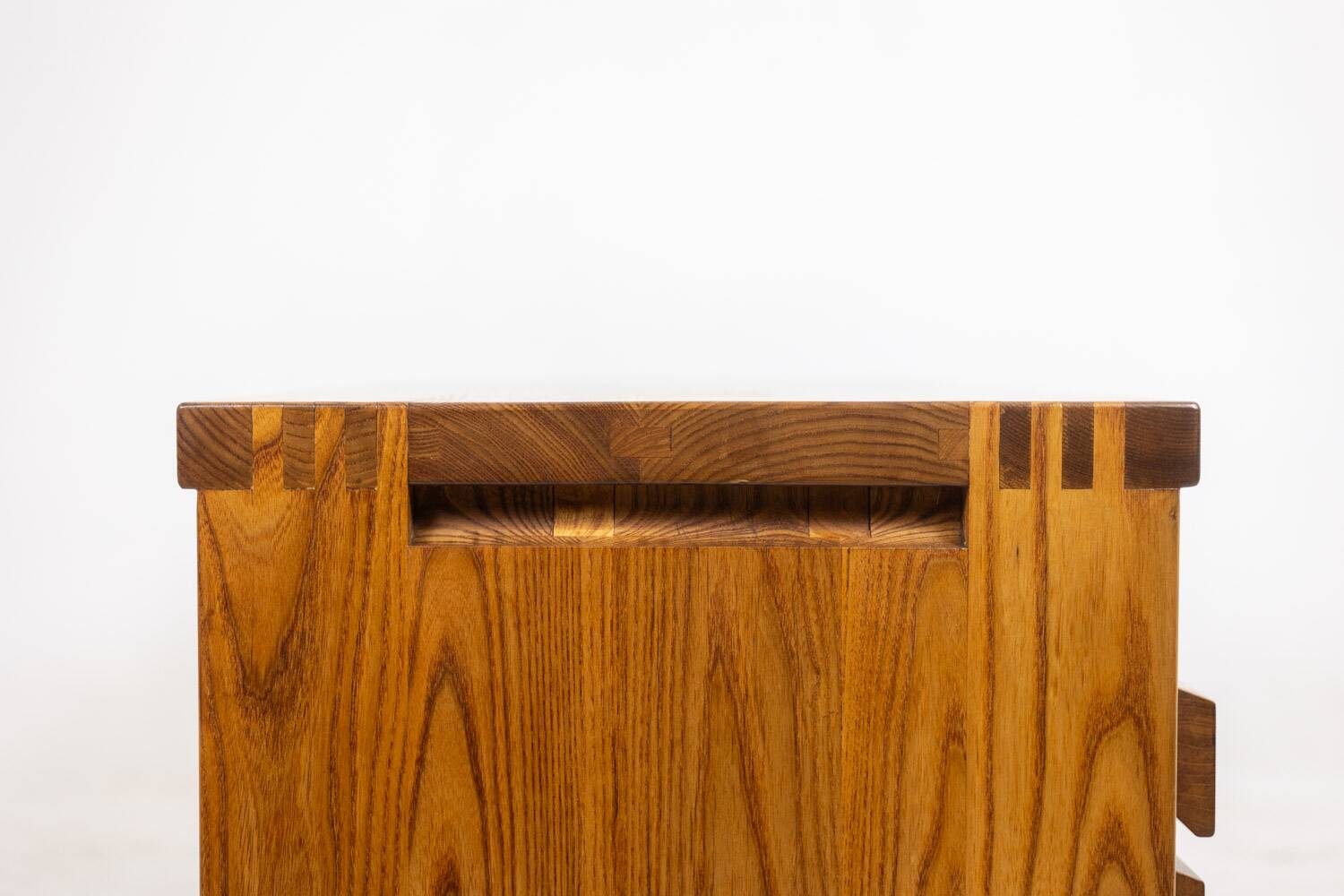 Pierre Chapo. Low chest of drawers in blond elm. Circa 1970.