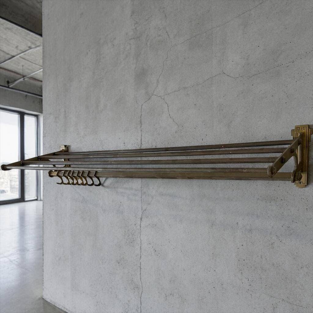 Vintage wall coat rack in gilded brass