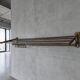 Vintage wall coat rack in gilded brass