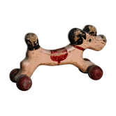 Wooden poodle with wheels, pink and red, flooring game to shoot
