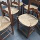 Six old straw chairs