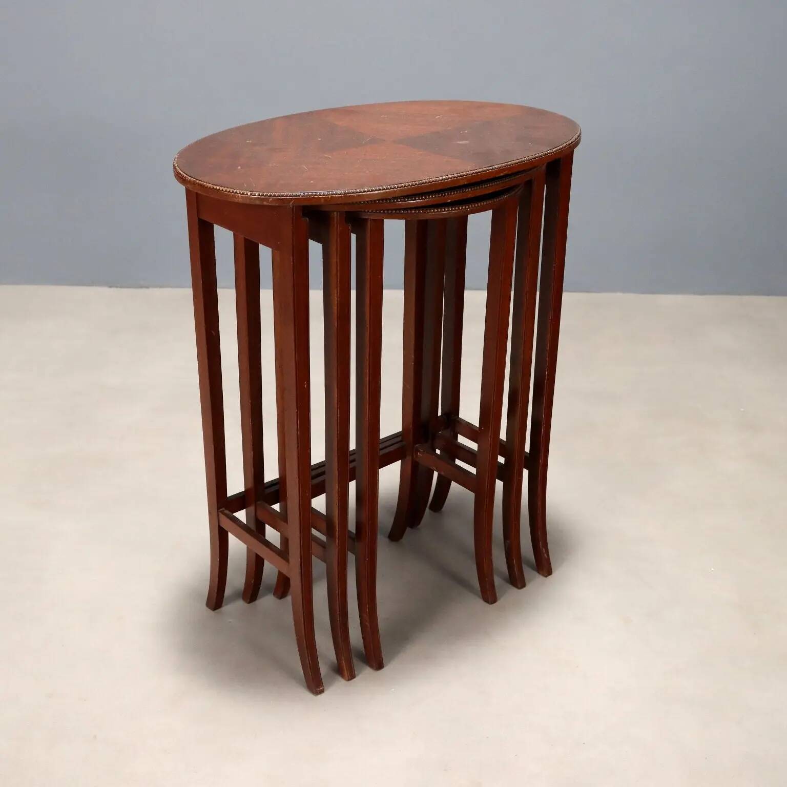 Antique mahogany coffee tables, carved frame, 19th century.