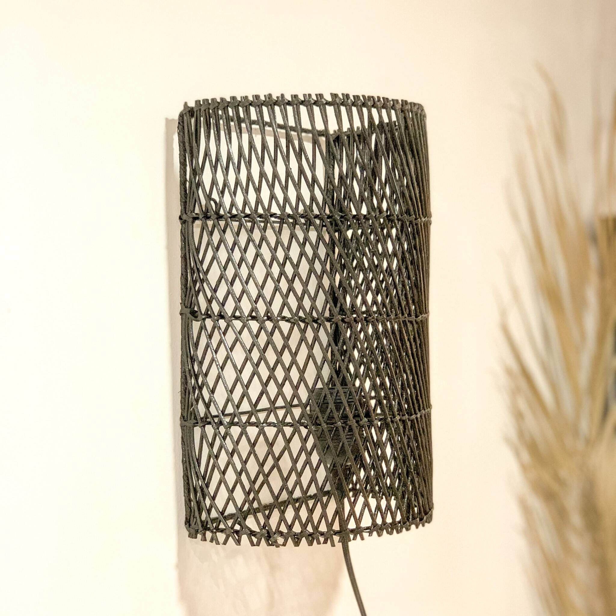 Black rattan wall light