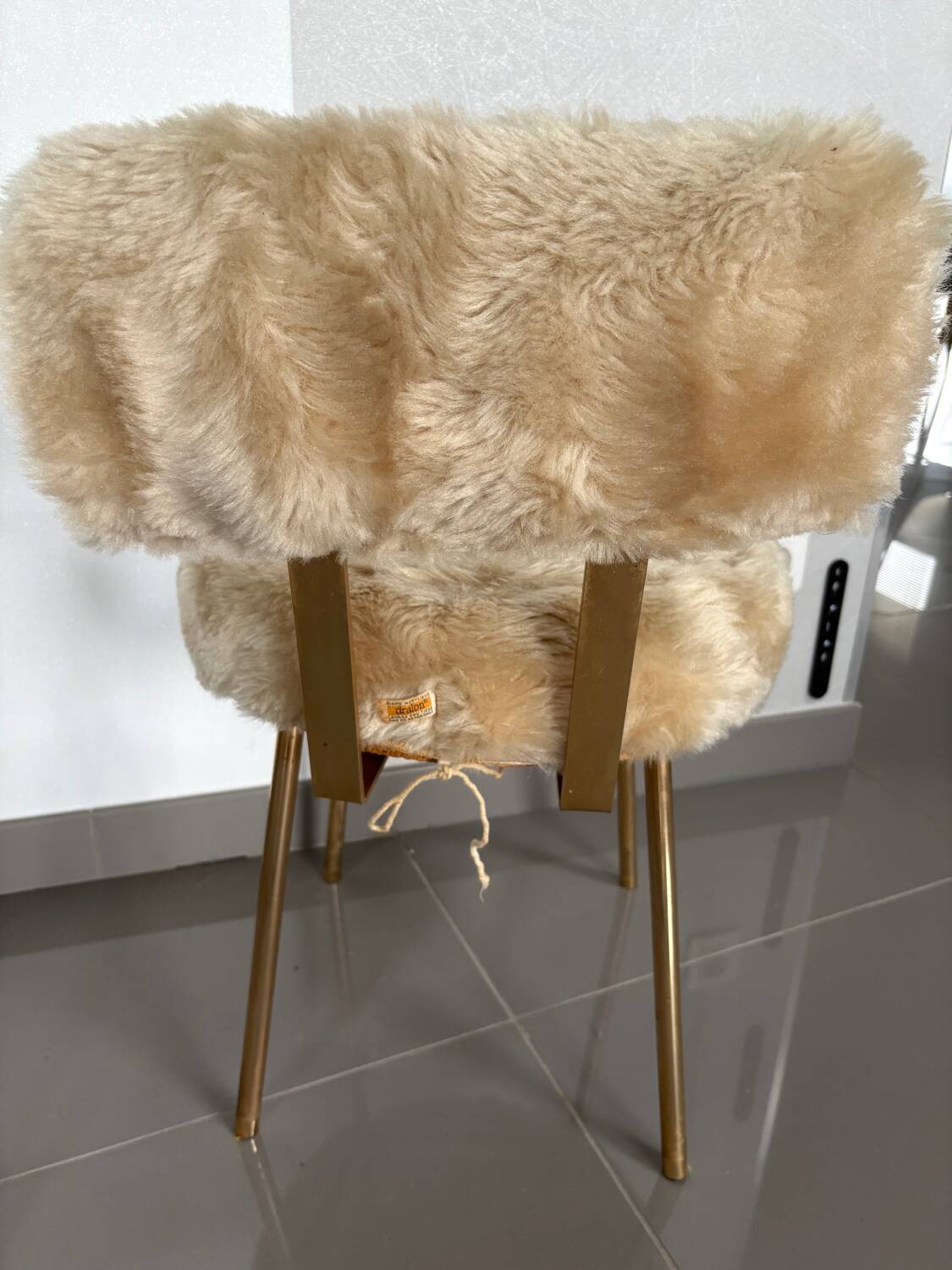 Pair of vintage chairs in beige Dralon® and gold metal.
