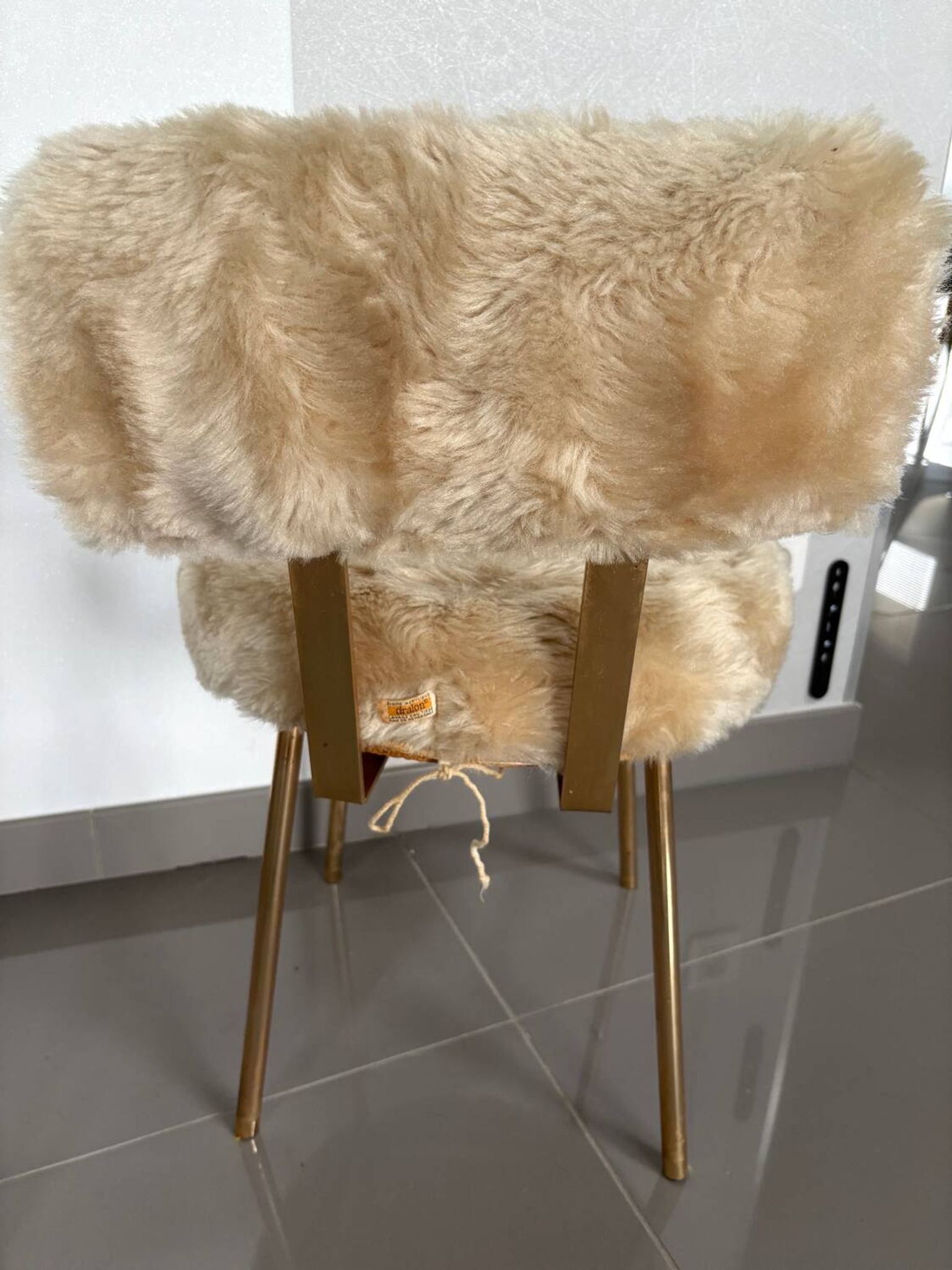 Pair of vintage chairs in beige Dralon® and gold metal.