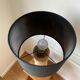 Lampe de table en pierre et coton noir