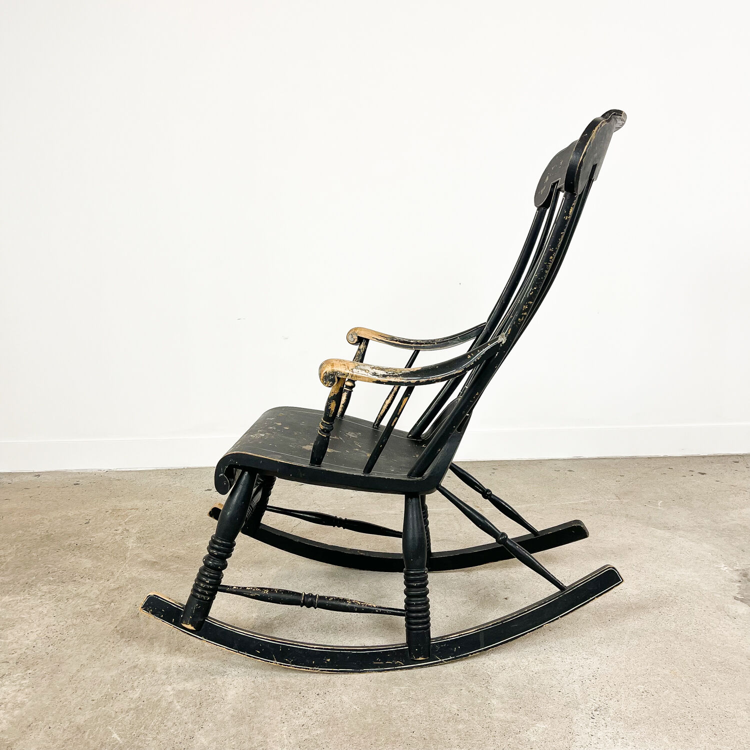Swedish antique black painted rocking chair