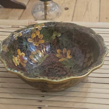 Vintage Asian brass bowl with floral decoration.