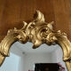 Miroir rocaille en bois doré