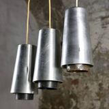 Trio of Raak steel pendant lights, 1960s