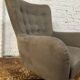 Swivel armchair in velvet fabric and metal