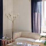 Vintage coffee table with glass, mirror, and brass.