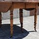Extendable round table (with extensions and flaps), cherry wood.