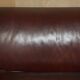 Vintage Art Deco leather sofa, three-seater, feather cushions.