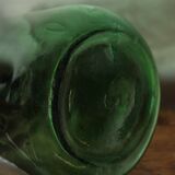 Give me a dark green glass Bonbonne jar.