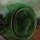 Give me a dark green glass Bonbonne jar.