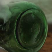 Give me a dark green glass Bonbonne jar.