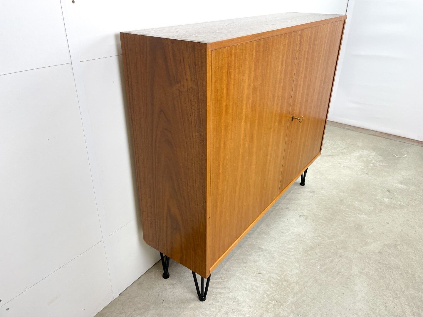 High vintage cabinet with hairpin legs
