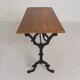 Bistro table with an oak top on a cast iron base, 1930s.