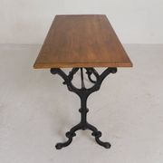 Bistro table with an oak top on a cast iron base, 1930s.