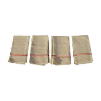 Four old linen tea towels