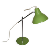 Green desk lamp with an arm from the 1970s.