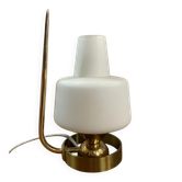 Table lamp in gold metal and opaline.
