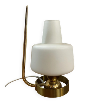 Table lamp in gold metal and opaline.