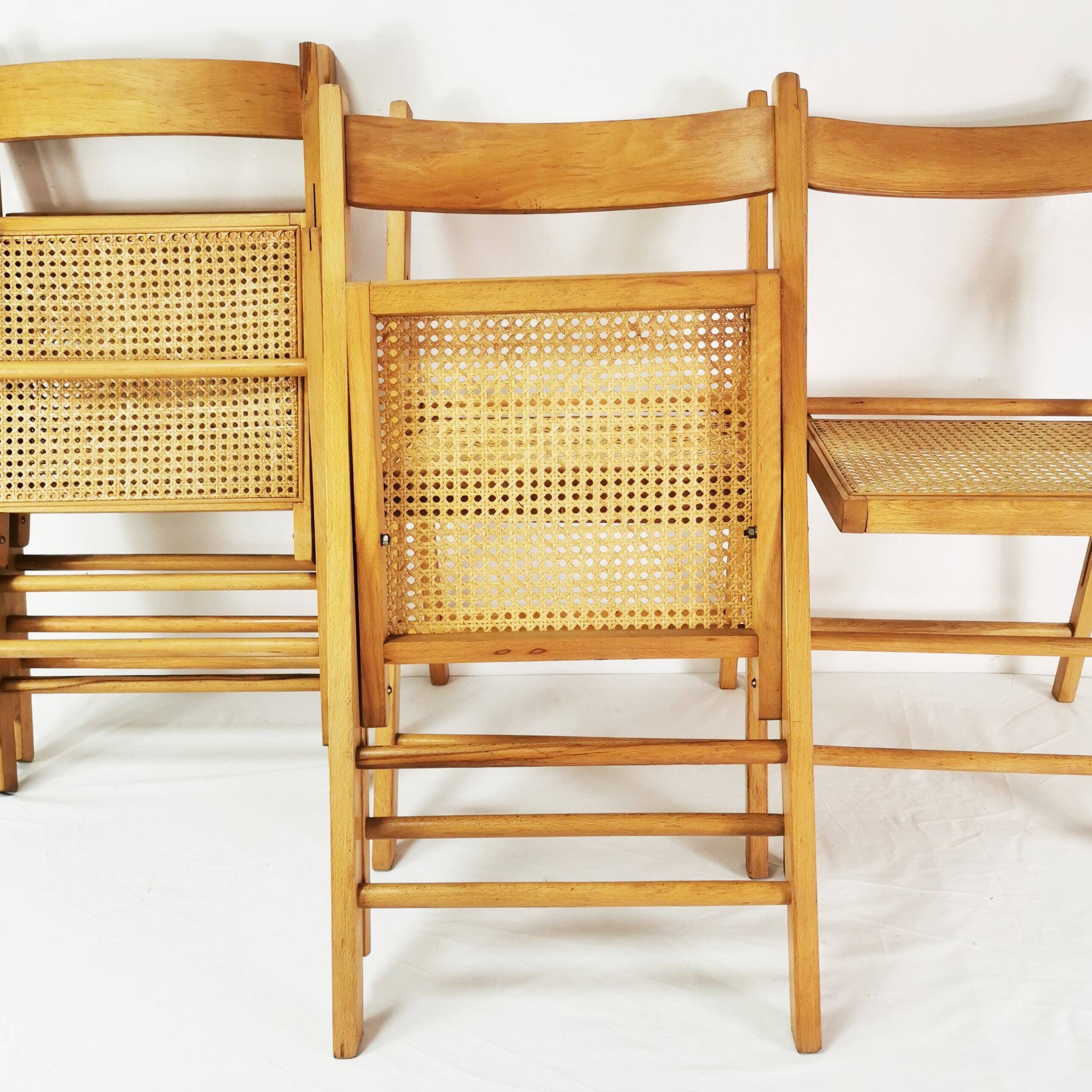 Set of folding chairs with raffia, Germany, 1980s.