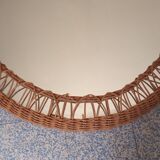 Oval mirror with woven rattan frame 63x47