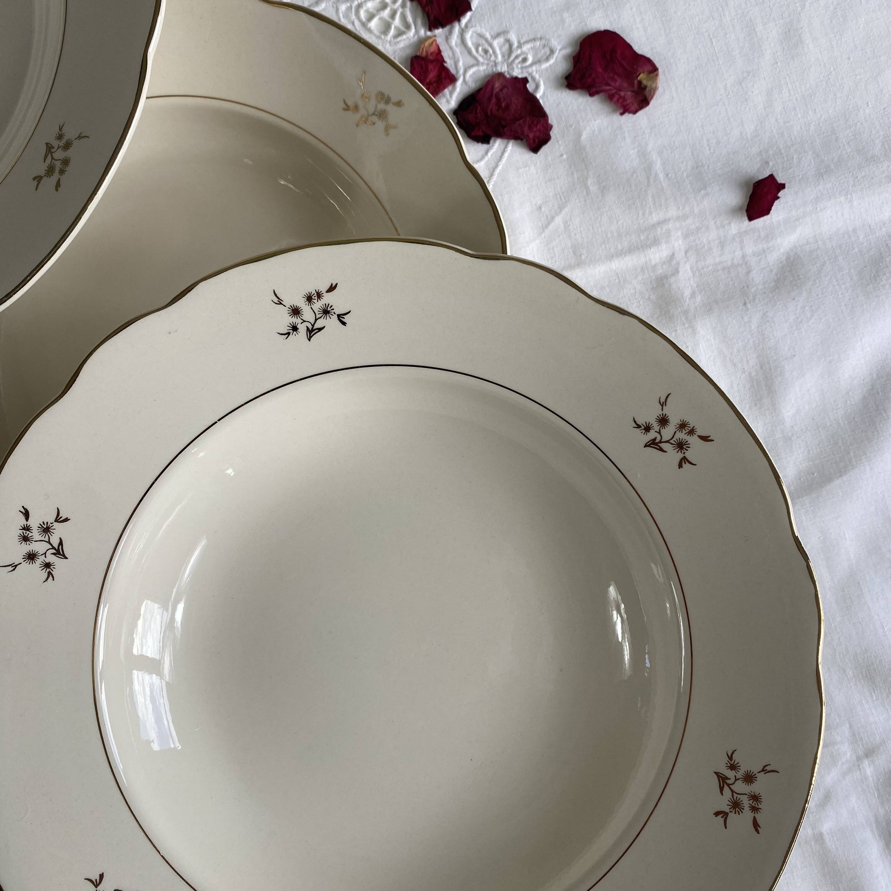6 antique cream and gold earthenware deep plates by Villeroy and Boch.
