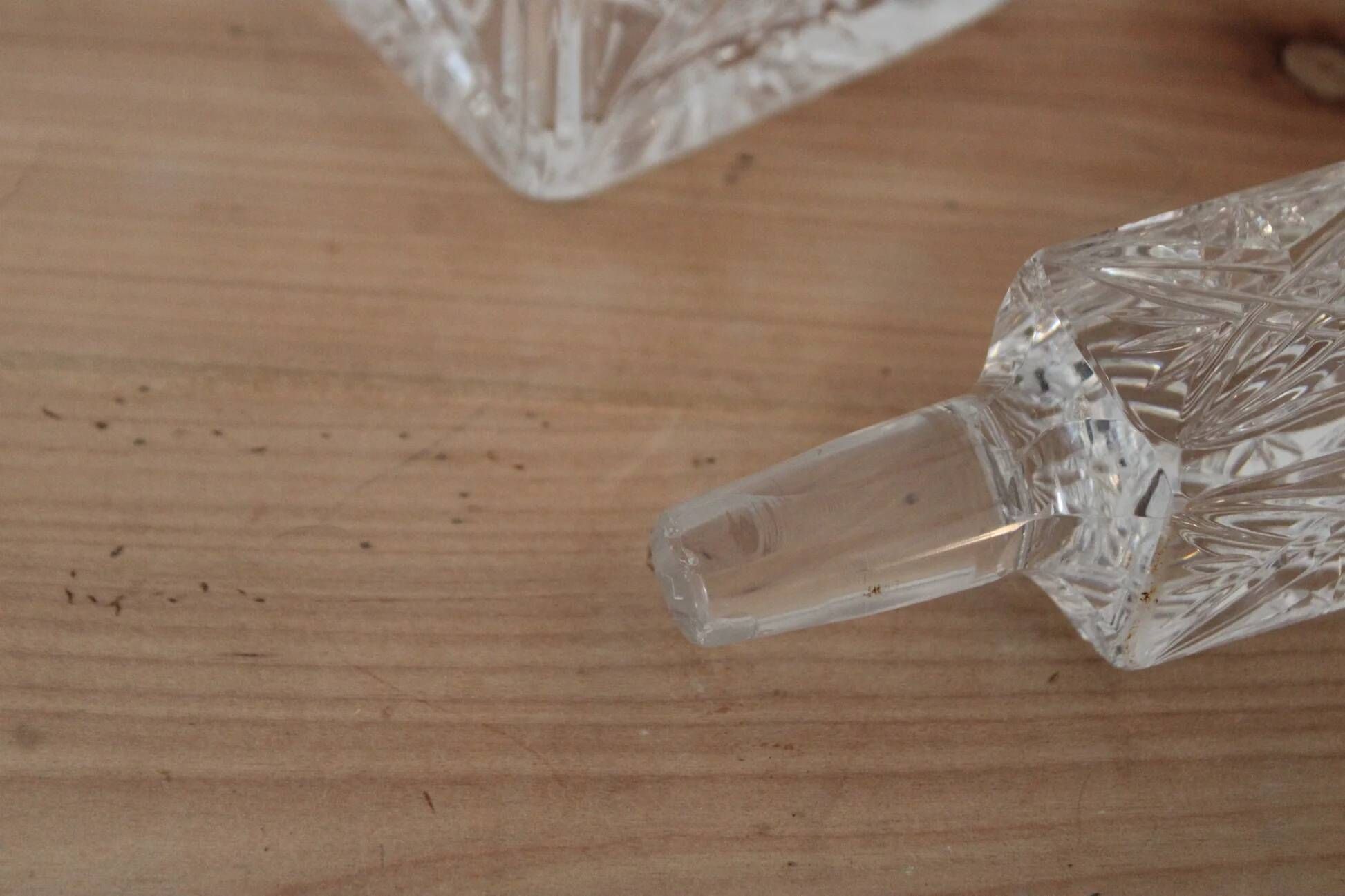 Antique cut glass carafe, probably crystal – Geometric patterns and matching stopper.