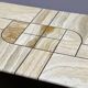 1970s travertine coffee table with sculptural top and solid oak base
