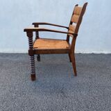 Vintage armchair in straw and brutalist wood